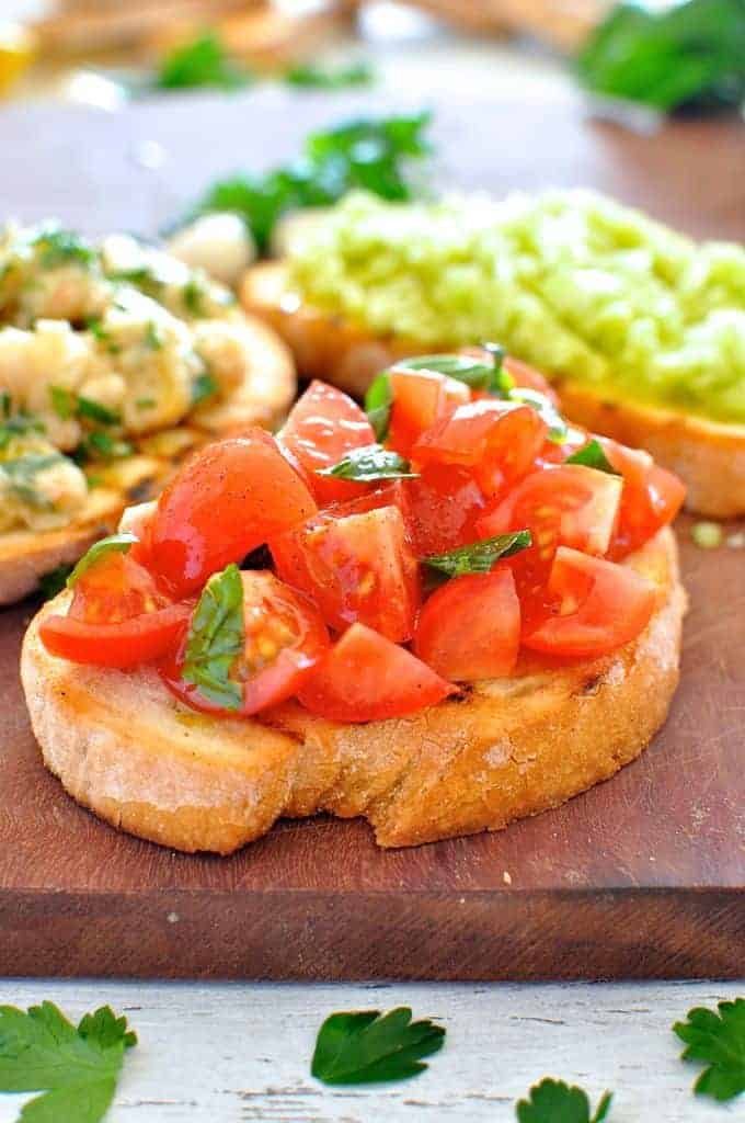 Tomato & Basil, Lemon Cannellini and a refreshing Celery Lime Bruschetta spread. Classic Italian toppings.