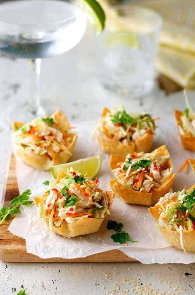 A serving board of Thai Chicken Salad Wonton Cups