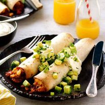 Bacon and Egg Breakfast Enchiladas on a plate