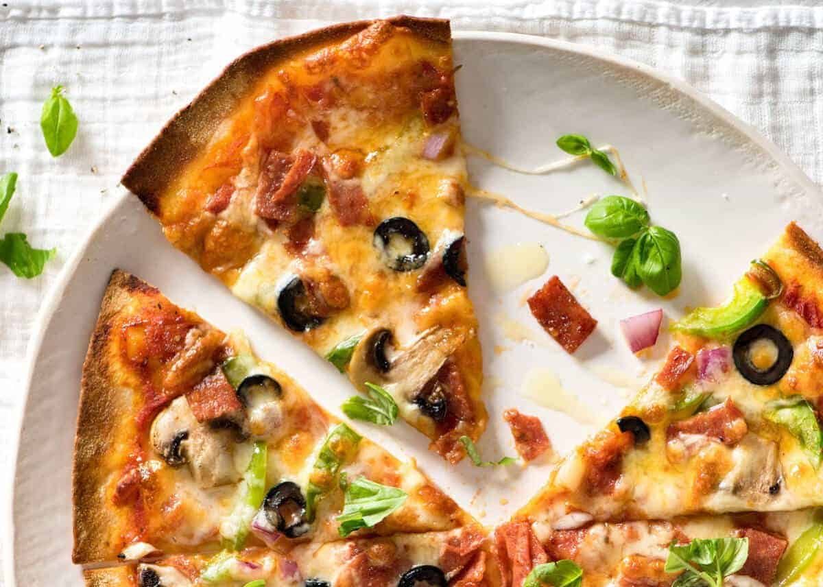 $2 Homemade Frozen Pizzas - quick and easy made using flatbreads, cook from frozen for a terrific Thin & Crispy pizza! www.recipetineats.com